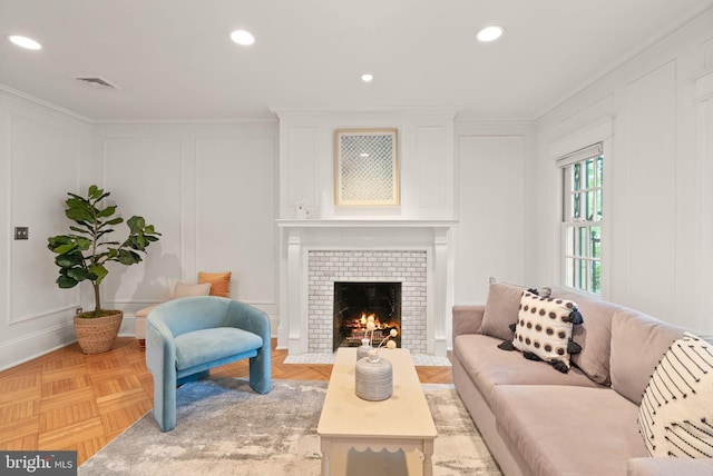 2314 20th St NW, Washington, DC 20009 - living area featuring a decorative wall, a fireplace, recessed lighting, and crown molding