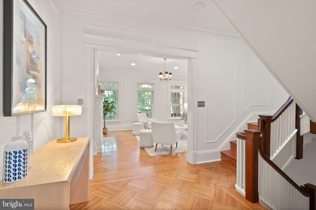 2314 20th St NW, Washington, DC 20009 - hallway featuring a decorative wall, a chandelier, stairway, crown molding, and recessed lighting