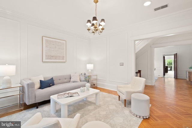 2314 20th St NW, Washington, DC 20009 - living room featuring a decorative wall, a chandelier, and ornamental molding