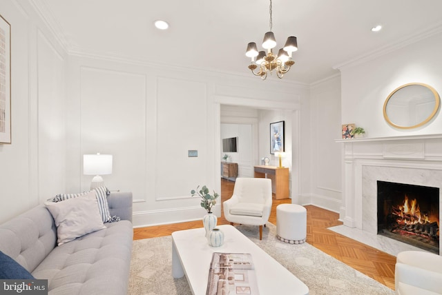 2314 20th St NW, Washington, DC 20009 - living area featuring a decorative wall, crown molding, a chandelier, a high end fireplace, and recessed lighting
