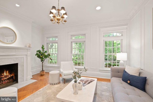 2314 20th St NW, Washington, DC 20009 - living room featuring a decorative wall, ornamental molding, plenty of natural light, a premium fireplace, and a chandelier