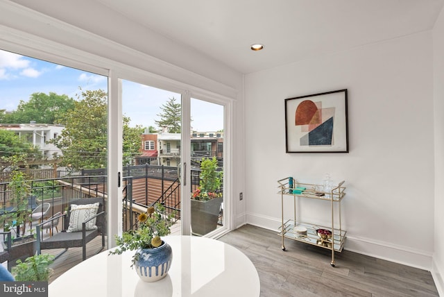 2314 20th St NW, Washington, DC 20009 - dining room featuring baseboards, wood finished floors, and recessed lighting