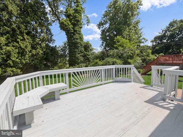 3817 Arbutus Ave, Baltimore, MD 21207 - wooden deck featuring stairway and view of wooded area