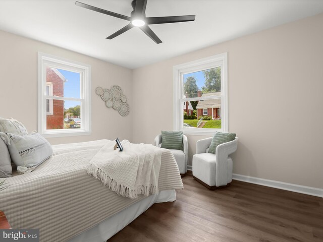 3817 Arbutus Ave, Baltimore, MD 21207 - bedroom with wood finished floors, baseboards, and ceiling fan