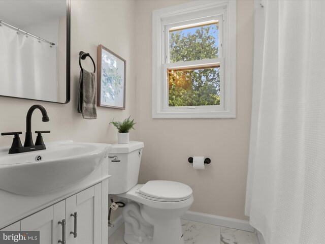 3817 Arbutus Ave, Baltimore, MD 21207 - bathroom with baseboards, vanity, marble finish floors, toilet, and a shower with shower curtain