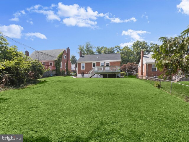 3817 Arbutus Ave, Baltimore, MD 21207 - view of yard with stairway and a wooden deck