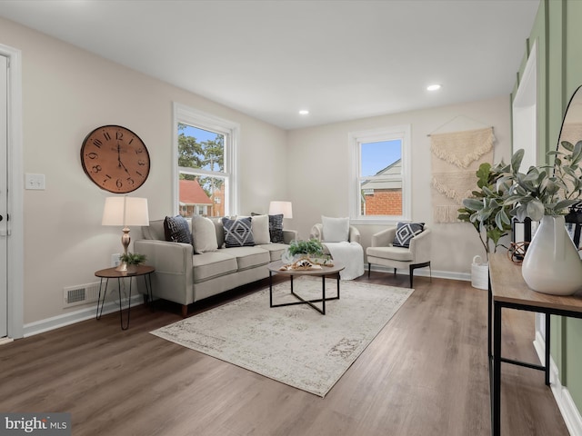 3817 Arbutus Ave, Baltimore, MD 21207 - living room with wood finished floors, healthy amount of natural light, baseboards, and recessed lighting