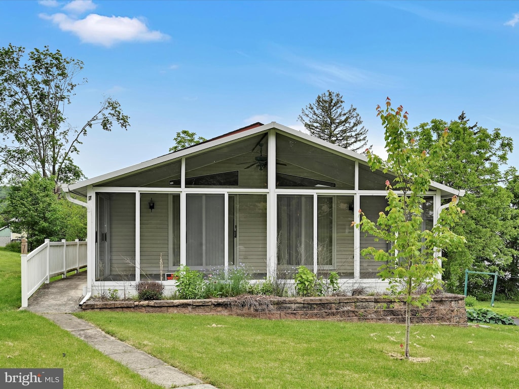 7 Zerbe St, Cressona, PA 17929 - view of front of property featuring a sunroom and a front lawn