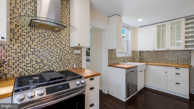409 W 10th Ave, Conshohocken, PA 19428 - kitchen featuring butcher block countertops, stainless steel appliances, wall chimney exhaust hood, white cabinetry, and recessed lighting