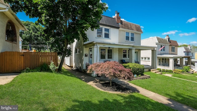 409 W 10th Ave, Conshohocken, PA 19428 - view of front facade featuring a porch, a chimney, stucco siding, and a gate