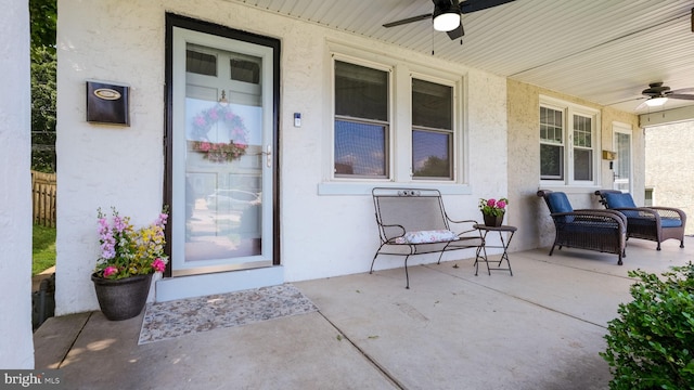 409 W 10th Ave, Conshohocken, PA 19428 - property entrance featuring ceiling fan, stucco siding, and a porch