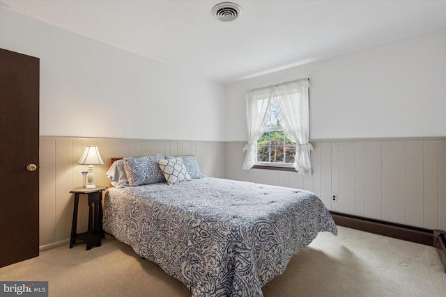 10 Mccarthy Ave, Langhorne, PA 19047 - bedroom featuring carpet, a wainscoted wall, and wood walls