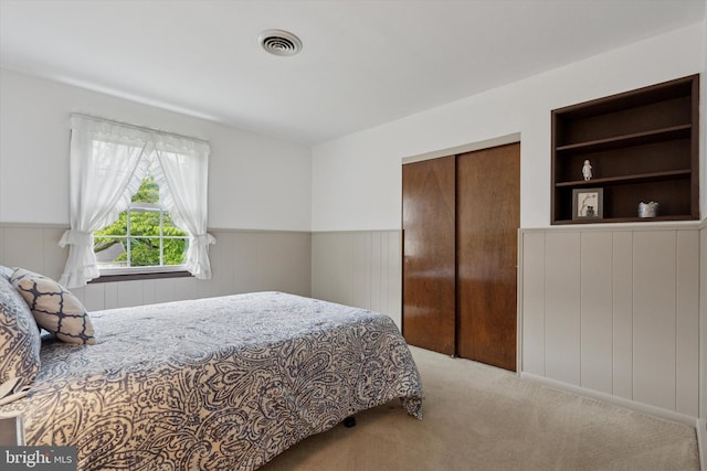 10 Mccarthy Ave, Langhorne, PA 19047 - carpeted bedroom with wainscoting and a closet