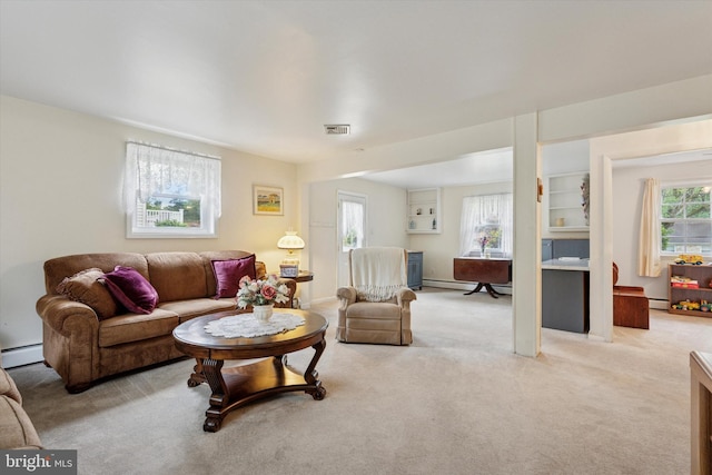 10 Mccarthy Ave, Langhorne, PA 19047 - living area featuring baseboard heating and light colored carpet