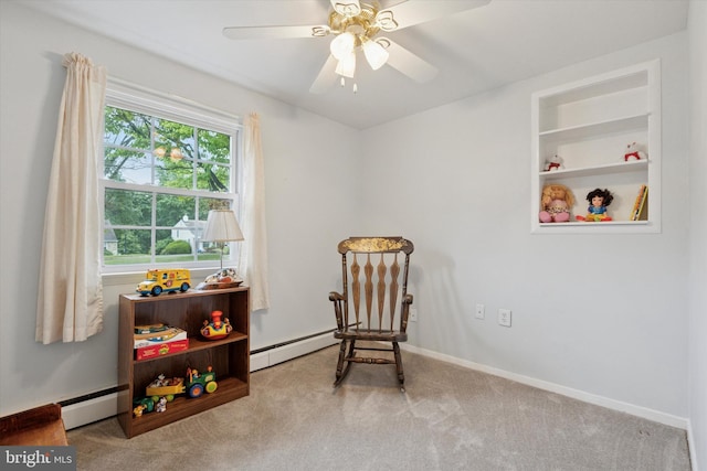 10 Mccarthy Ave, Langhorne, PA 19047 - sitting room featuring a baseboard heating unit, carpet, ceiling fan, and baseboards