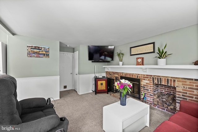 230 Aqua Ln, Delran, NJ 08075 - carpeted living area featuring a brick fireplace and a wainscoted wall