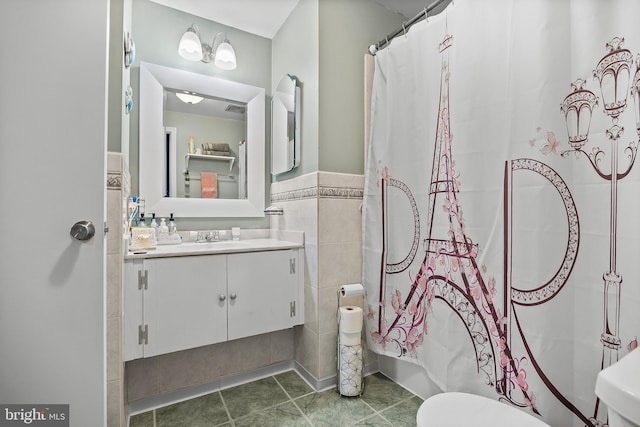 230 Aqua Ln, Delran, NJ 08075 - bathroom featuring vanity, tile patterned floors, toilet, shower / bath combo, and tile walls