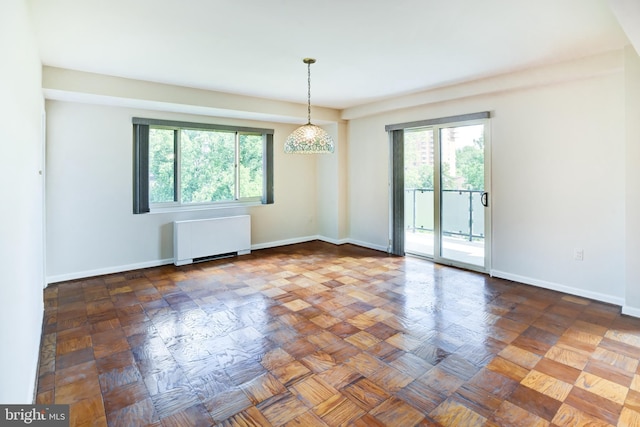 4201 Cathedral Ave NW Unit 1004E, Washington, DC 20016 - unfurnished room with radiator and baseboards