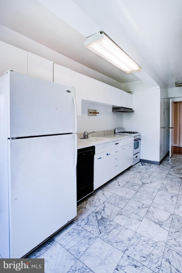 4201 Cathedral Ave NW Unit 1004E, Washington, DC 20016 - kitchen with white appliances, light countertops, white cabinets, range hood, and a sink
