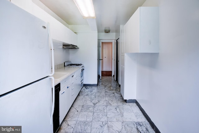 4201 Cathedral Ave NW Unit 1004E, Washington, DC 20016 - kitchen featuring white appliances, baseboards, white cabinets, and light countertops