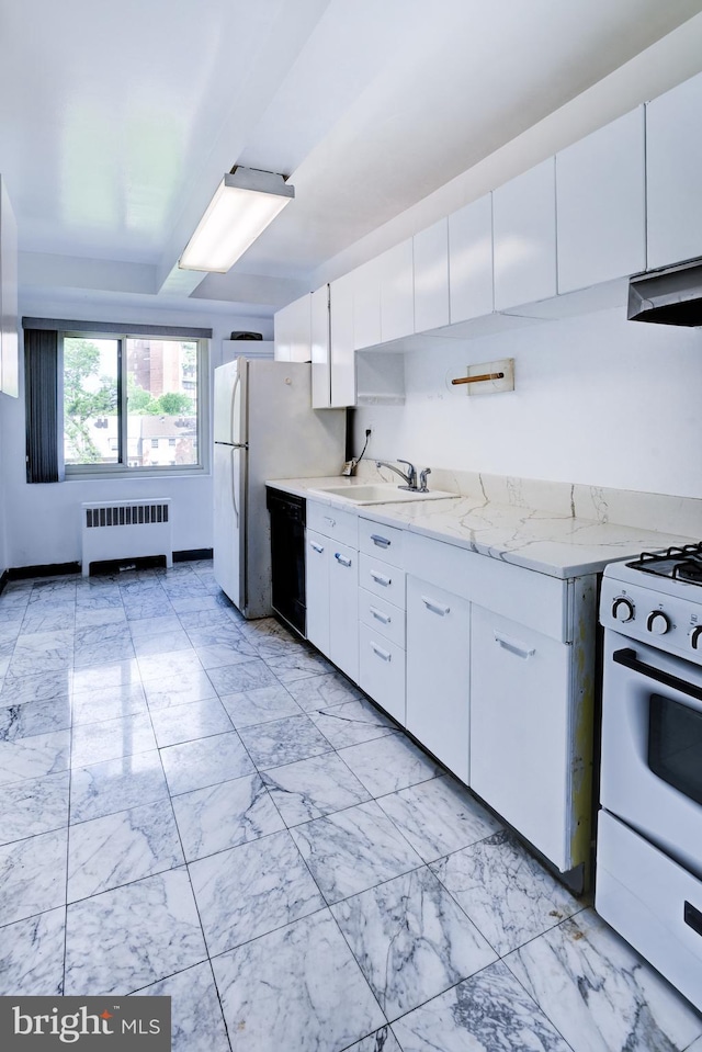 4201 Cathedral Ave NW Unit 1004E, Washington, DC 20016 - kitchen with radiator heating unit, white appliances, a sink, and light marble finish floors