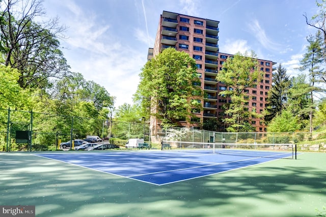 4201 Cathedral Ave NW Unit 1004E, Washington, DC 20016 - view of tennis court featuring community basketball court