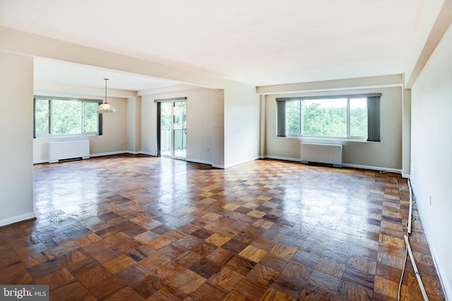 4201 Cathedral Ave NW Unit 1004E, Washington, DC 20016 - spare room with radiator heating unit and baseboards