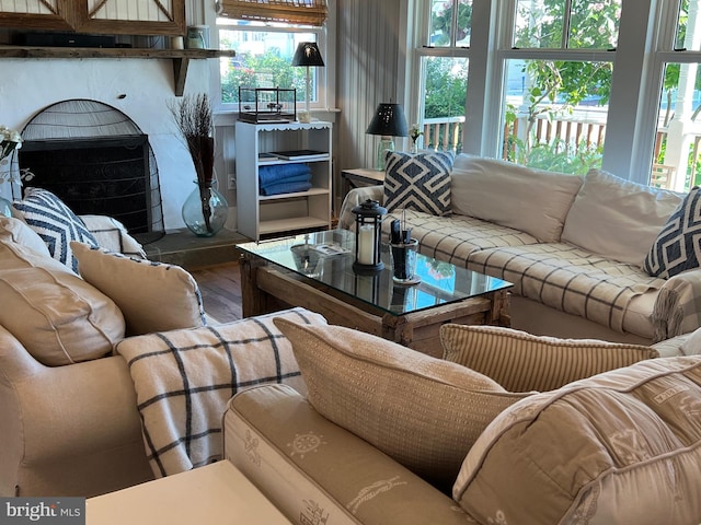 204 Coral St, Beach Haven, NJ 08008 - living room featuring wood finished floors and a fireplace