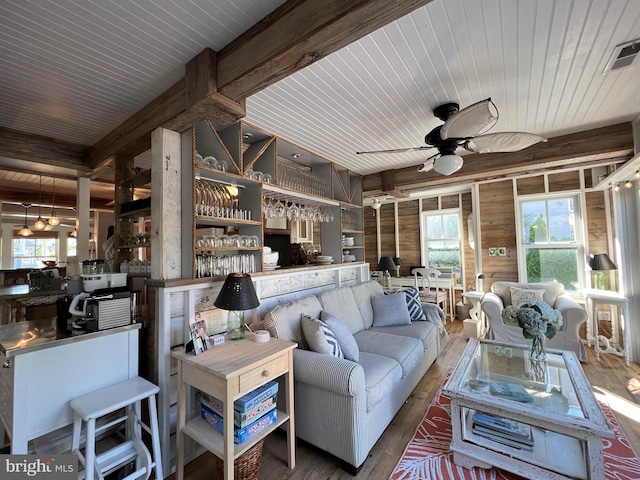 204 Coral St, Beach Haven, NJ 08008 - living room featuring wooden ceiling, ceiling fan, healthy amount of natural light, wooden walls, and wood-type flooring