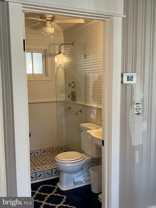 204 Coral St, Beach Haven, NJ 08008 - bathroom with a shower stall, ceiling fan, and toilet