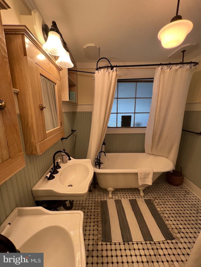 204 Coral St, Beach Haven, NJ 08008 - full bathroom with a freestanding bath, a sink, and tile patterned floors