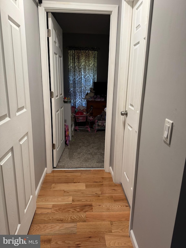 71 Shultz Way, Moorefield, WV 26836 - hallway featuring light wood finished floors and baseboards