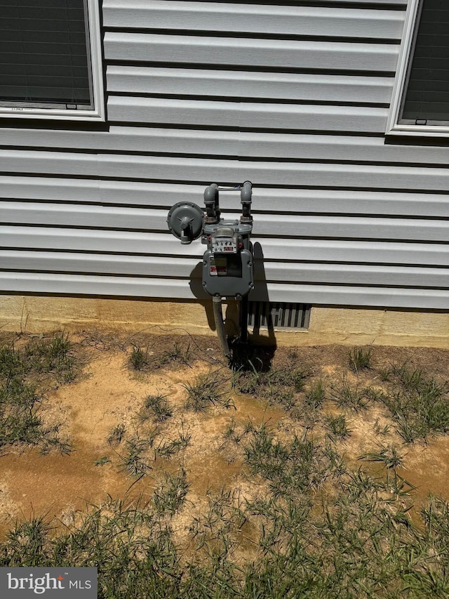 71 Shultz Way, Moorefield, WV 26836 - exterior view of crawl space and gas meter