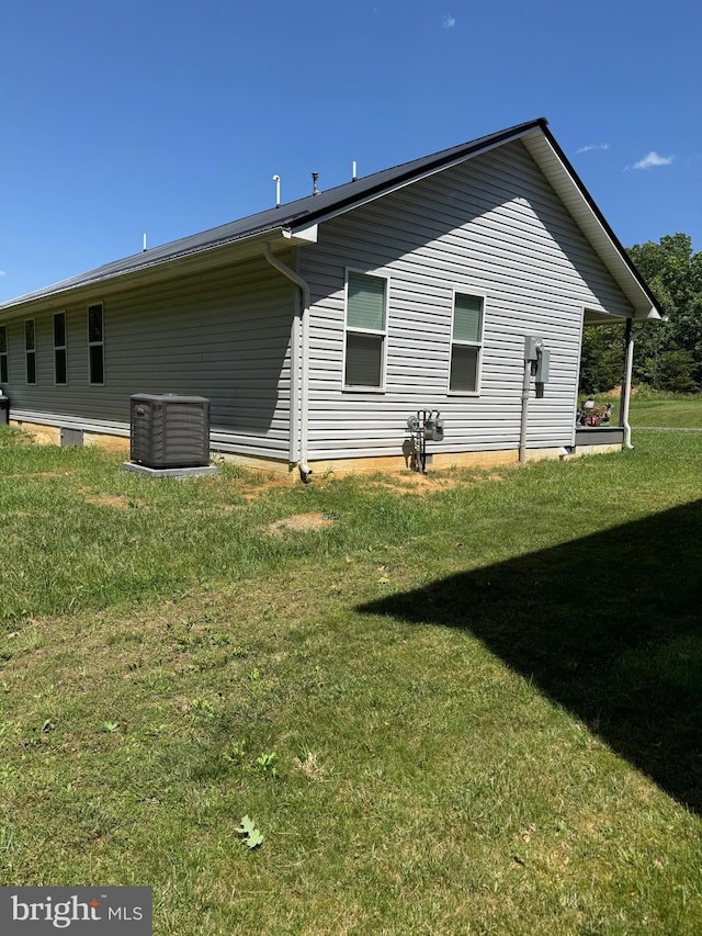 71 Shultz Way, Moorefield, WV 26836 - rear view of property with central air condition unit and a yard