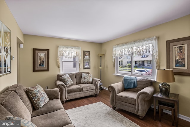 74 N Chester Ave, Riverside, NJ 08075 - living room featuring plenty of natural light, dark wood-style flooring, and baseboards