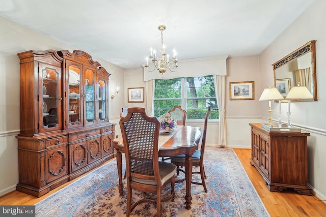 15320 Durant St, Silver Spring, MD 20905 - dining space with a chandelier and light wood-style floors