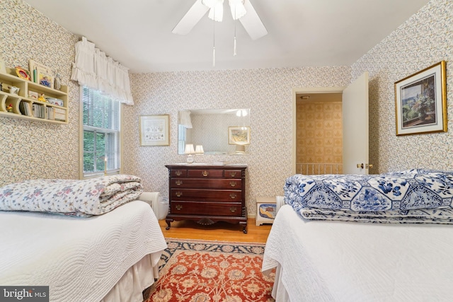 15320 Durant St, Silver Spring, MD 20905 - bedroom with wood finished floors, wallpapered walls, and ceiling fan