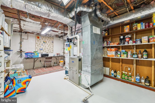15320 Durant St, Silver Spring, MD 20905 - unfinished below grade area with gas water heater and heating unit