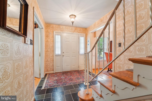 15320 Durant St, Silver Spring, MD 20905 - foyer with wallpapered walls, stone tile floors, and stairs