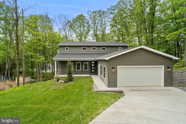 2645 Carribean Rd, Du Bois, PA 15801 - view of front of house featuring concrete driveway, a garage, a front yard, roof with shingles, and covered porch