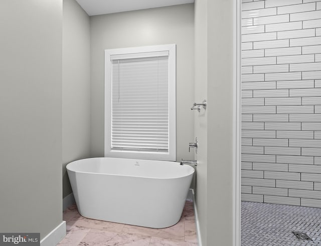 2645 Carribean Rd, Du Bois, PA 15801 - full bath with a freestanding tub, marble look tile flooring, baseboards, and tiled shower
