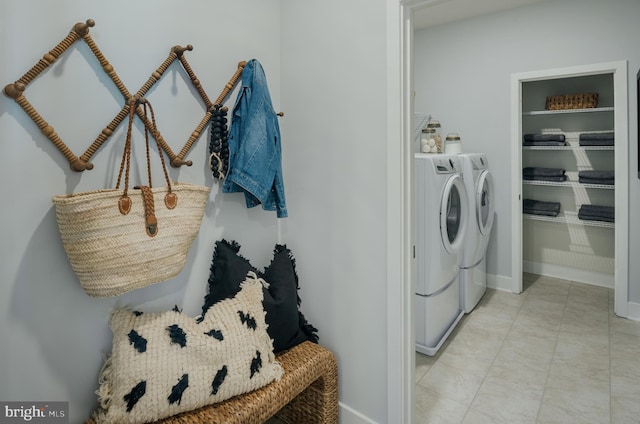 36531 Burleson Dr, Frankford, DE 19945 - laundry area with washing machine and clothes dryer and baseboards