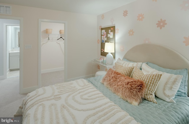 36531 Burleson Dr, Frankford, DE 19945 - carpeted bedroom featuring a walk in closet, baseboards, and a closet