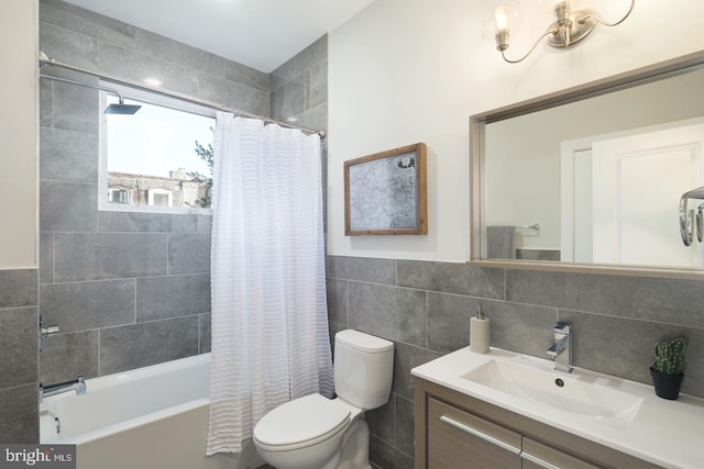 1212 E Susquehanna Ave Unit D, Philadelphia, PA 19125 - bathroom featuring tile walls, toilet, shower / bathtub combination with curtain, and vanity
