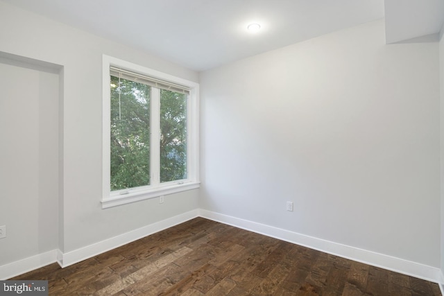 1212 E Susquehanna Ave Unit D, Philadelphia, PA 19125 - unfurnished room with baseboards and dark wood-type flooring
