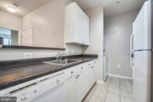2765 Centerboro Dr Unit 362, Vienna, VA 22181 - kitchen featuring white appliances, a sink, white cabinets, dark countertops, and light tile patterned floors