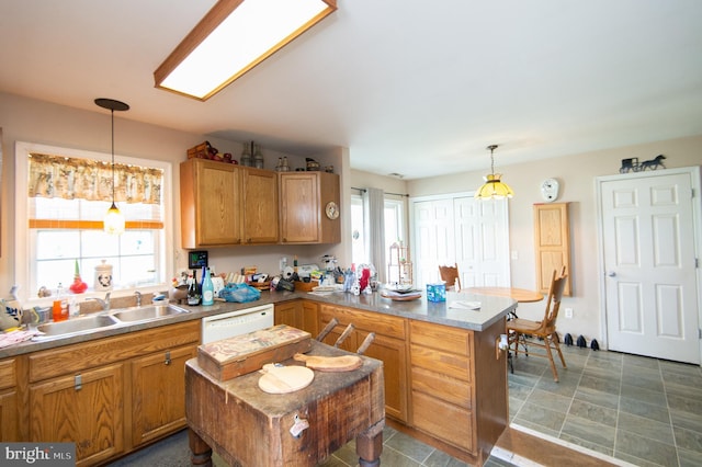 5294 Bucktown Rd, Cambridge, MD 21613 - kitchen with a sink, a peninsula, healthy amount of natural light, and white dishwasher