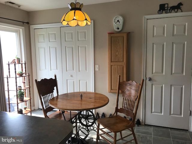 5294 Bucktown Rd, Cambridge, MD 21613 - dining area with dark tile patterned flooring