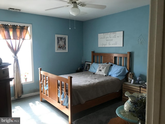 5294 Bucktown Rd, Cambridge, MD 21613 - carpeted bedroom featuring a ceiling fan and baseboards