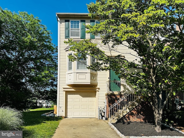 2560 Stow Ct, Crofton, MD 21114 - view of front facade with an attached garage and driveway